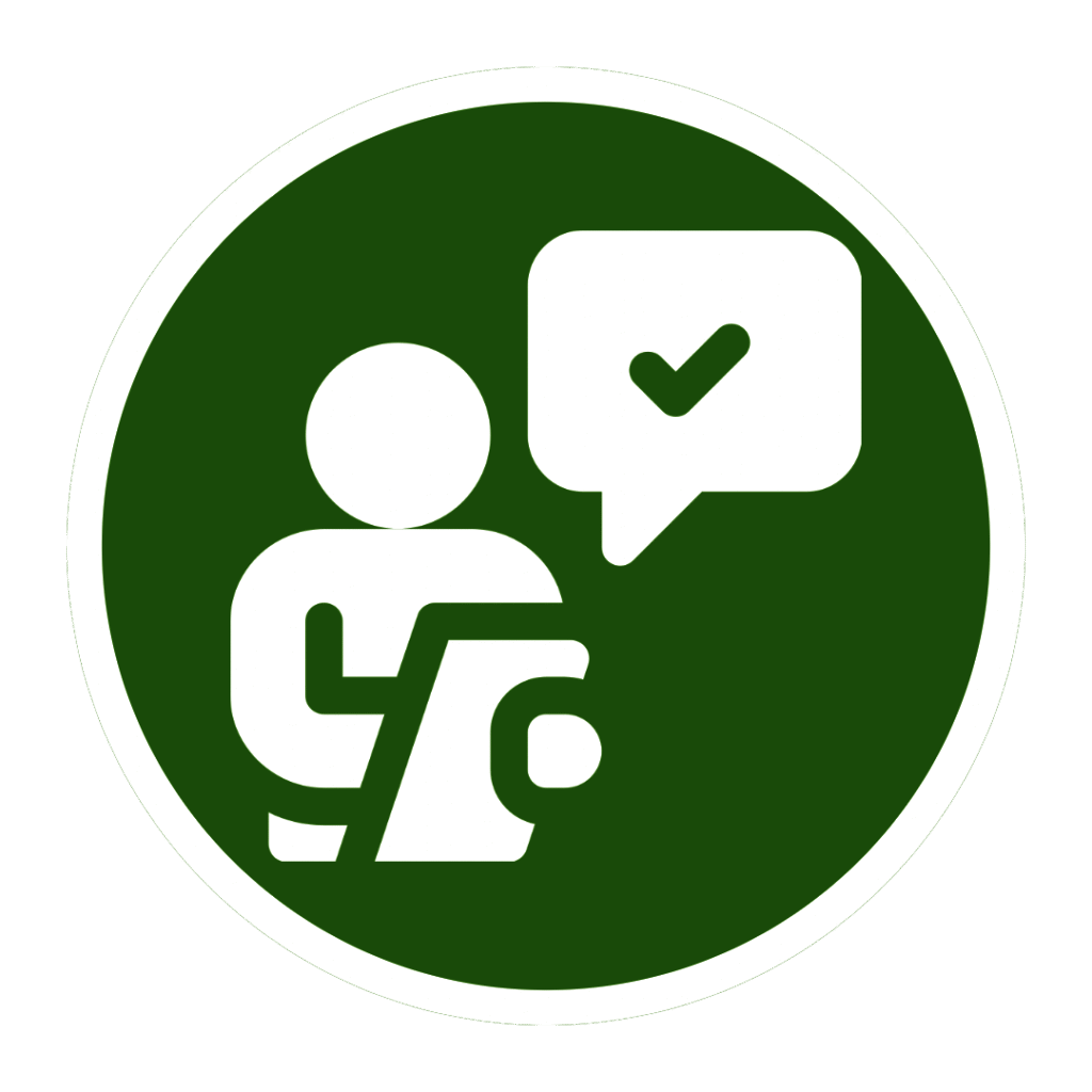 Icon of a person at a desk with a check mark